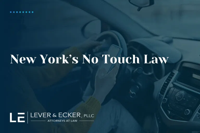 a person holding their phone while driving in New York