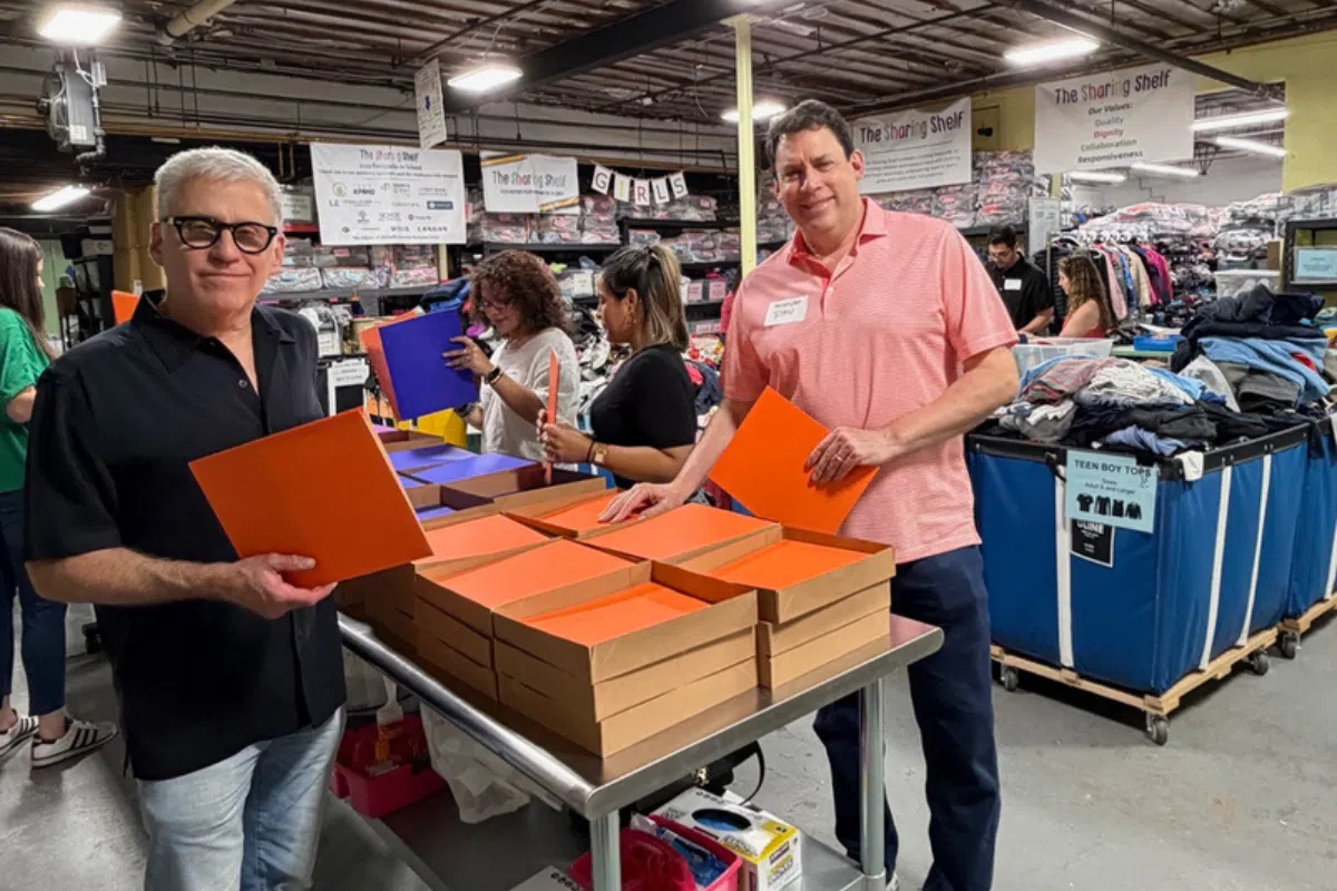 David B. Lever and Daniel G. Ecker volunteering at the Sharing Shelf in Port Chester