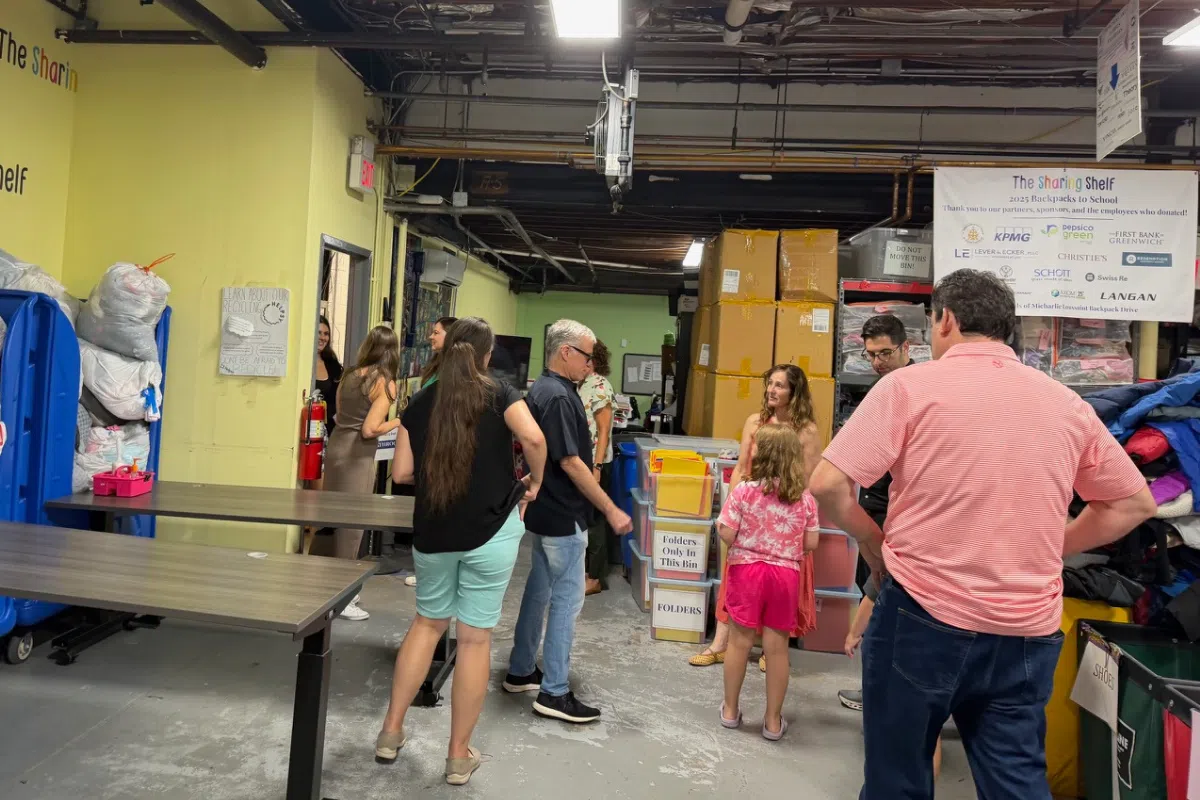 David B. Lever, Daniel G. Ecker, Kate Henderson, and the Lever & Ecker team at the Sharing Shelf event in Port Chester