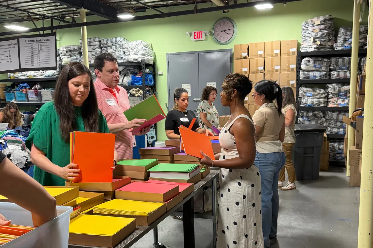 Daniel G. Ecker, Kate Henderson, and the Lever & Ecker team at the Sharing Shelf event in Port Chester