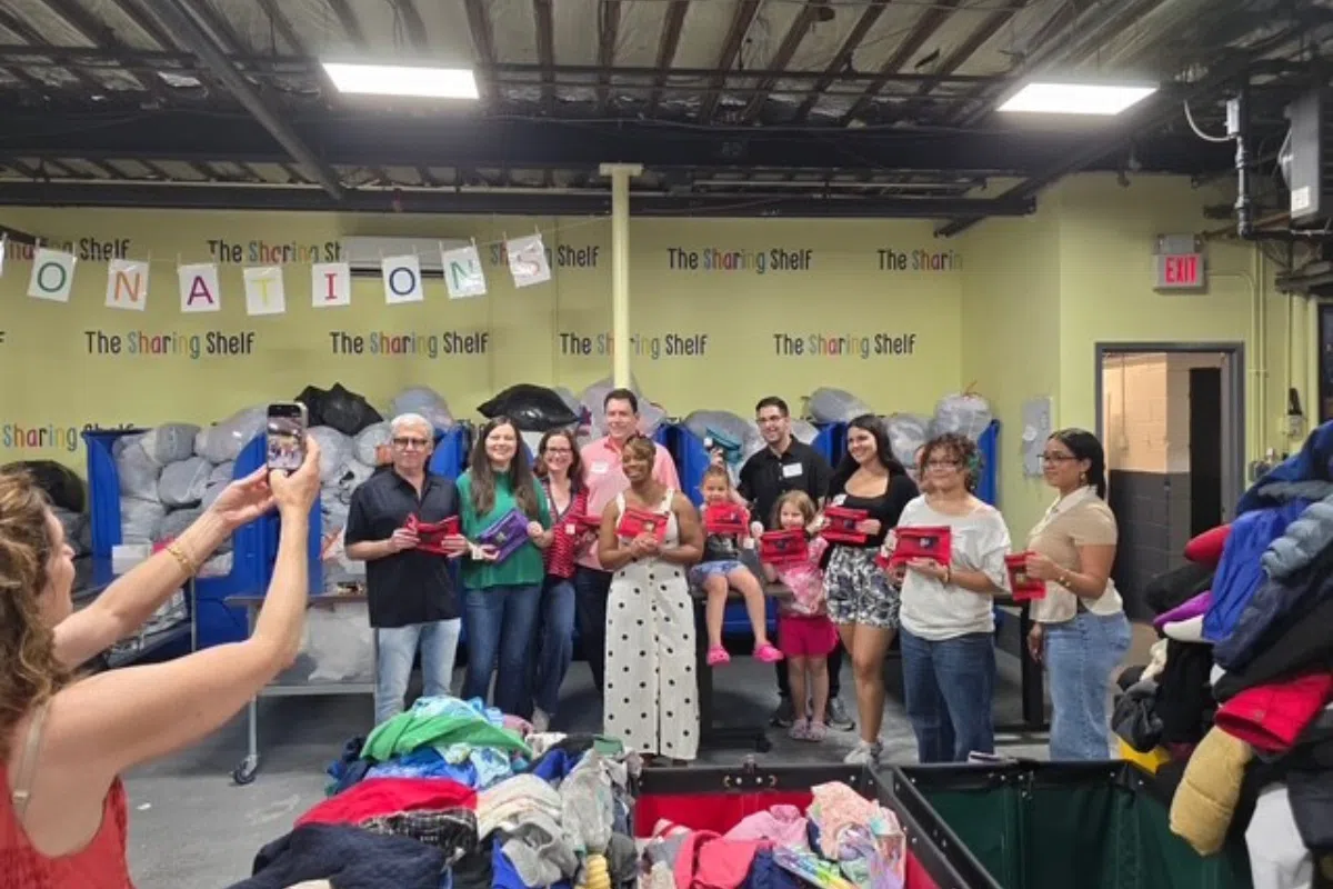 A group photo of the Lever & Ecker team volunteering at The Sharing Shelf in Port Chester