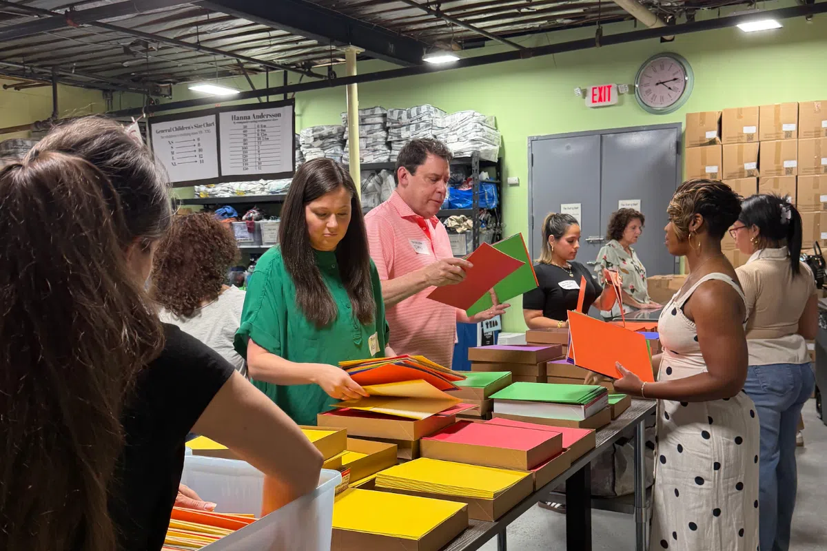 Daniel G. Ecker, Kate Henderson, and the Lever & Ecker team at the Sharing Shelf event in Port Chester