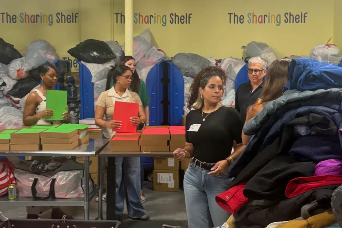 David B. Lever, Kate Henderson, Geraldine, and the Lever & Ecker team volunteering at the Sharing Shelf in Port Chester