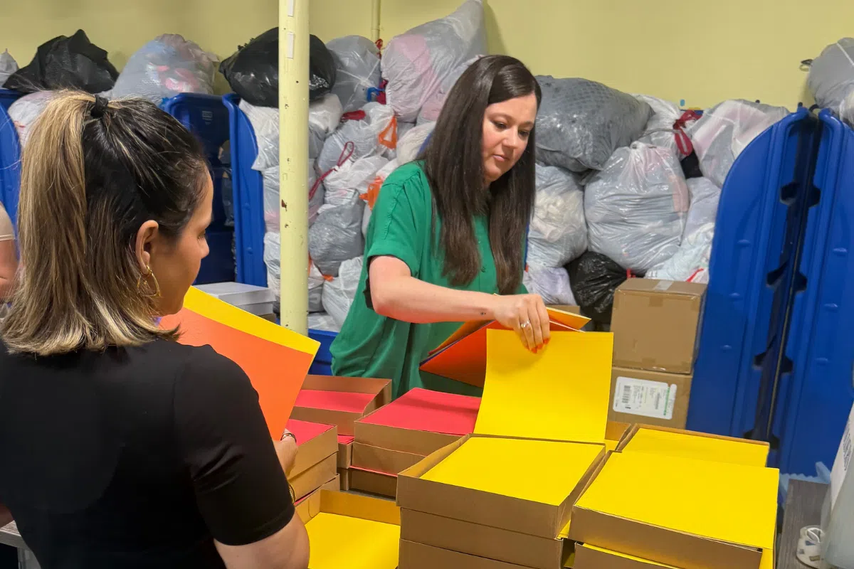 Kate Henderson and Geraldine volunteering at the Sharing Shelf in Port Chester